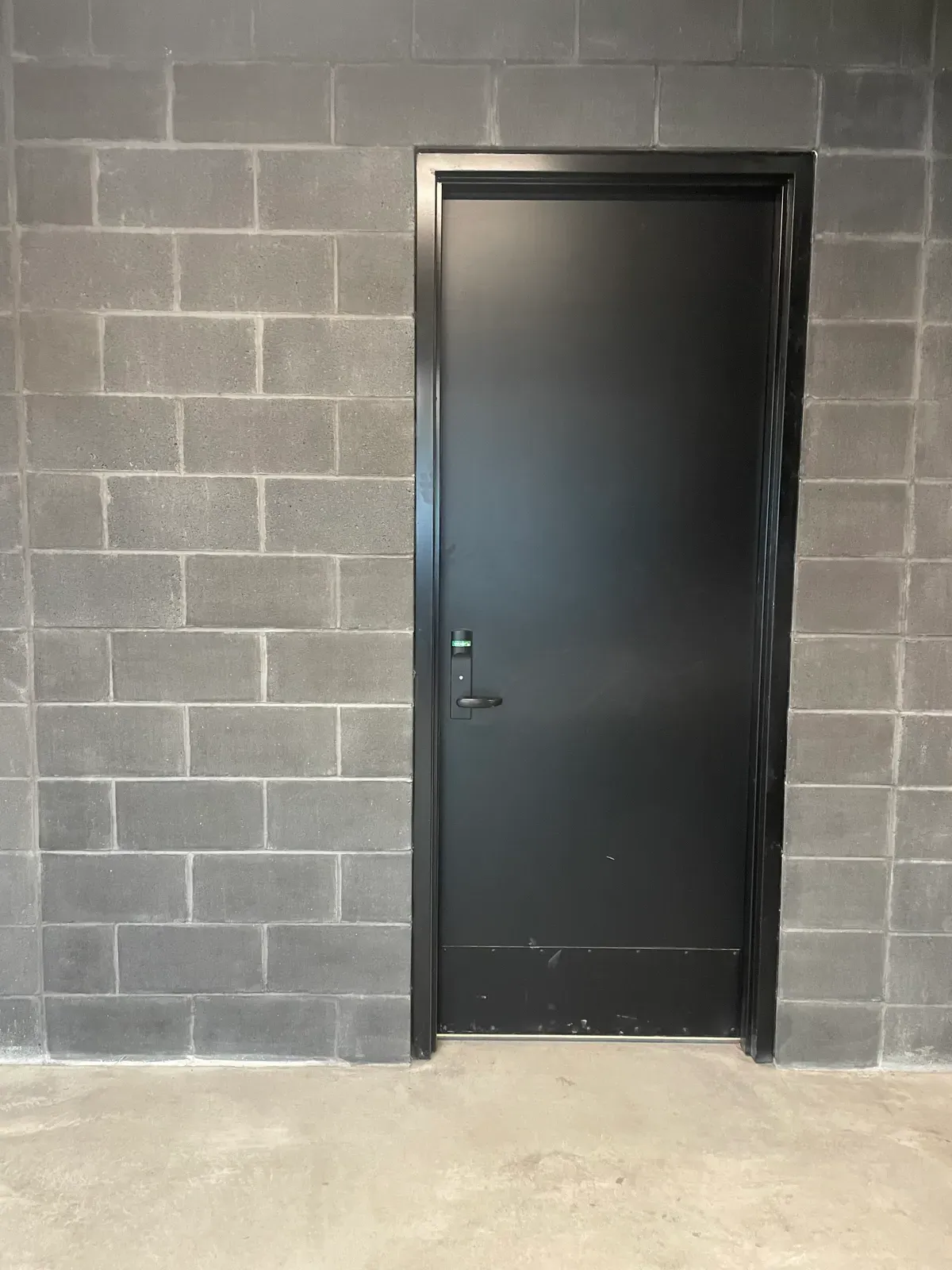 After: charcoal commercial brick staining completed by N&W Enterprises